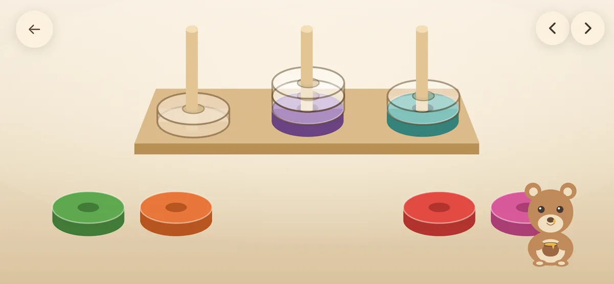 Three pegs showing faint outlines of the rings that still have to be placed