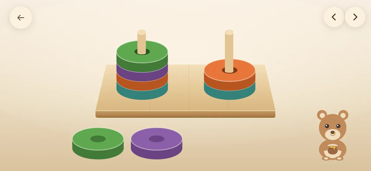 Two wooden pegs with a few coloured rings and two more waiting below