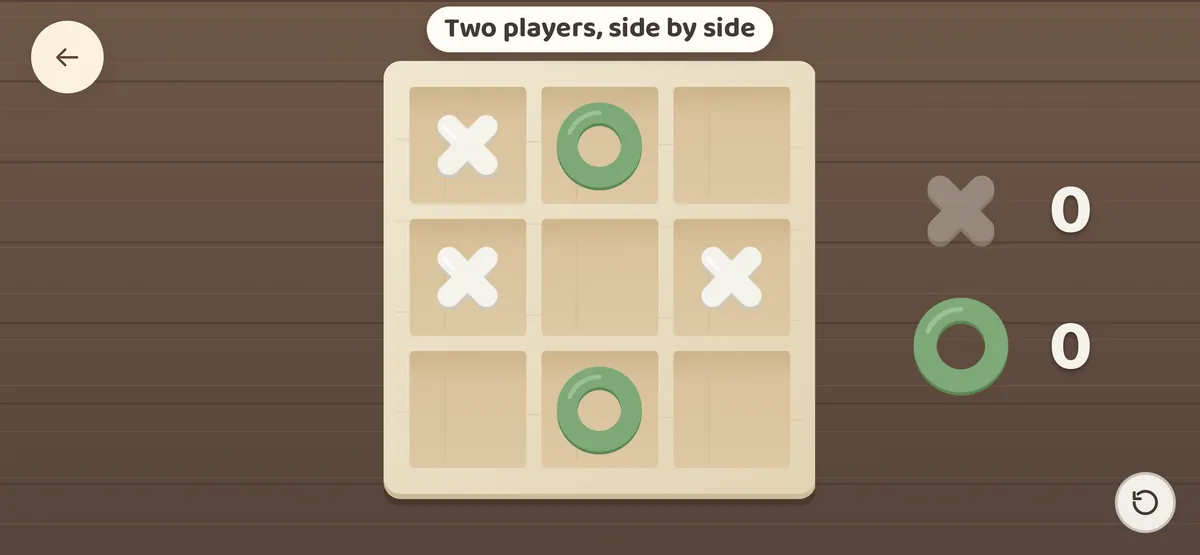 Tic-Tac-Toe — A wooden board for two players, side by side.