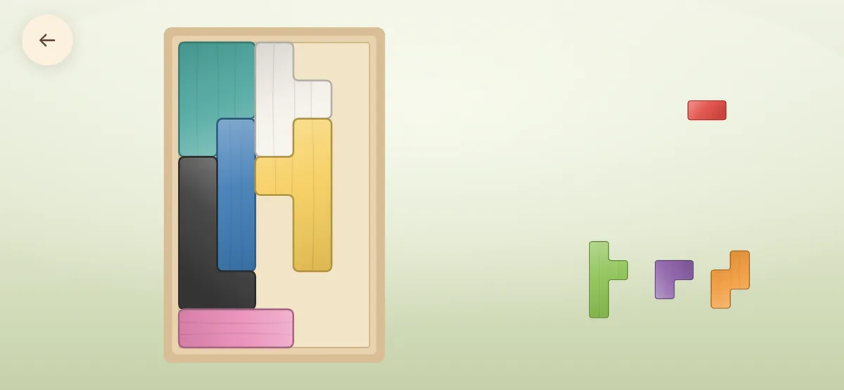 The same frame filled with eight coloured blocks and four small ones still to place